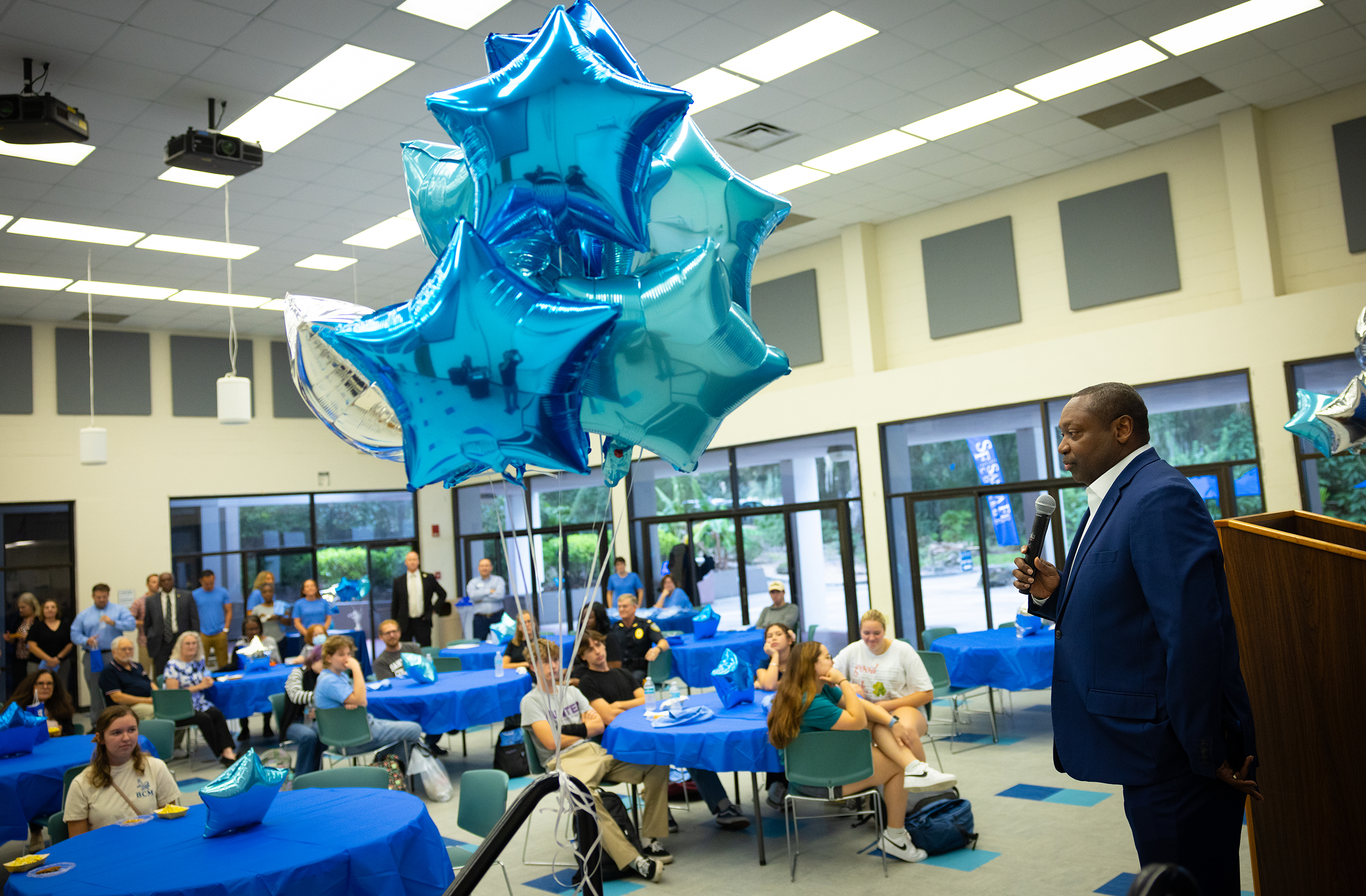 Santa Fe College President Paul Broadie addresses students and staff at the High School Dual Enrollment ceremony.