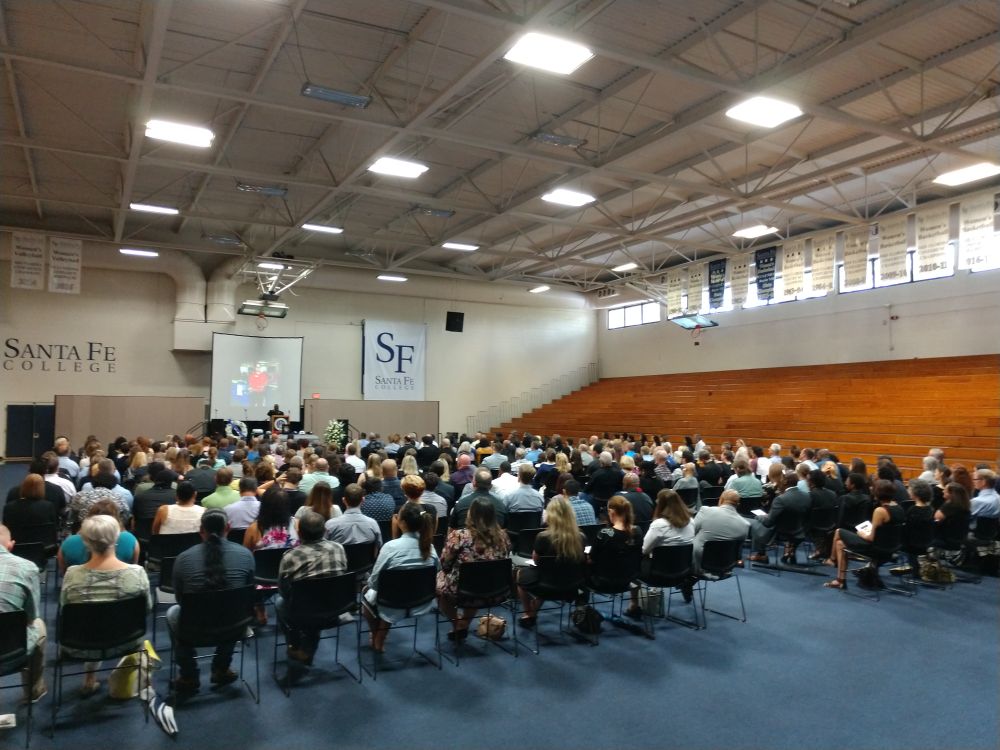 Family and friends attend the memorial service for Manny Hernandez