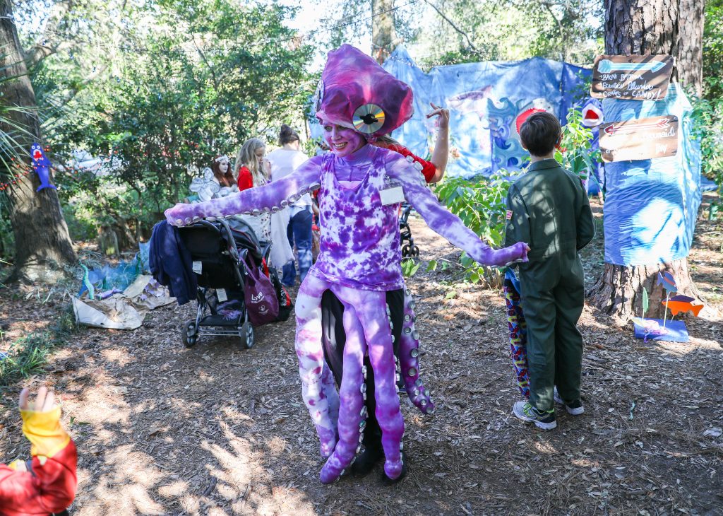 Families make their way through the Santa Fe College Teaching Zoo during the annual Boo at the Zoo event on Tuesday Oct. 31, 2017 in Gainesville, FL. Zoo faculty, staff and students dress in costumes and pass out candy to trick-or-treaters.  (photo by Matt Stamey/Santa Fe College)