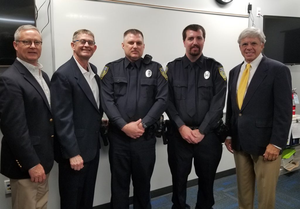 VP for Advancement Chuck Clemons, SFPD Chief Ed Book, Officer Bobby Bridgeman, Officer Kevin Nash and President Jackson Sasser at the swearing in of the two new SFPD officers.