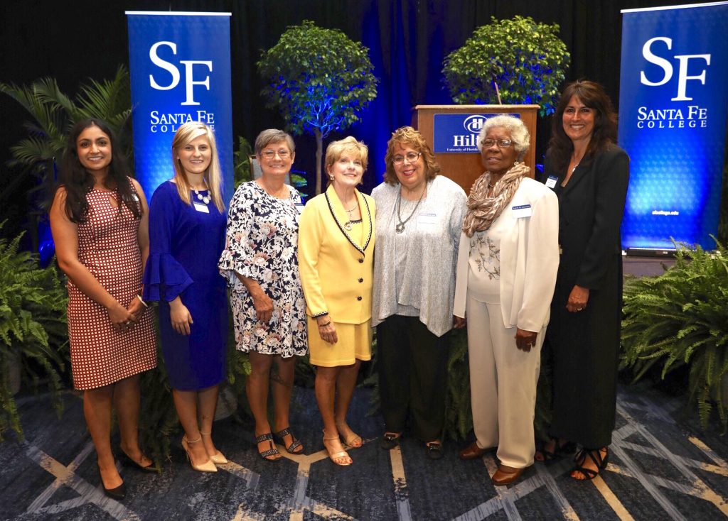 The 2019 honorees (left to right) Nilanjana Sengupta Caballero, Emily Acevedo (Woman of Promise), Linda Lee, Layne Sasser (Honorary Woman of Distinction), Carol Bosshardt, Gussie Lee and Fran Maris.