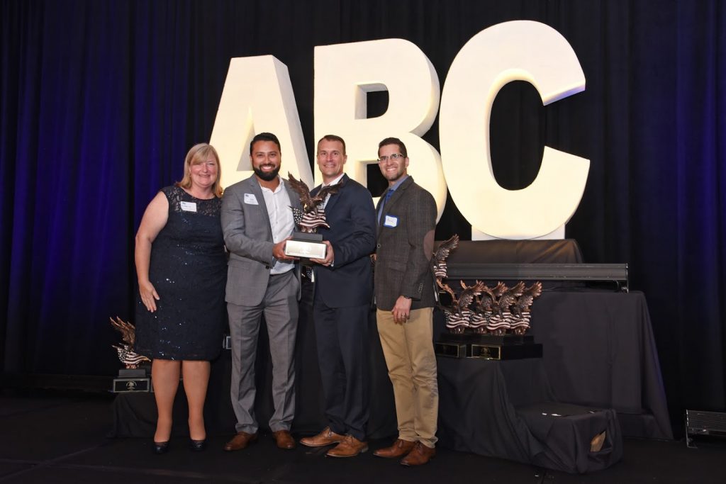 SF's Rebecca Rogers, with members from CPPI and Associated Builders and Contractors. CPPI was honored for their work on the expansion of the Institute of Public Safety.