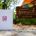 The 50th Anniversary Spring Arts Festival book photographed outside the SF Spring Arts House.