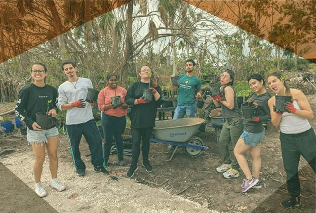 A group of people posing for a photo  Description automatically generated