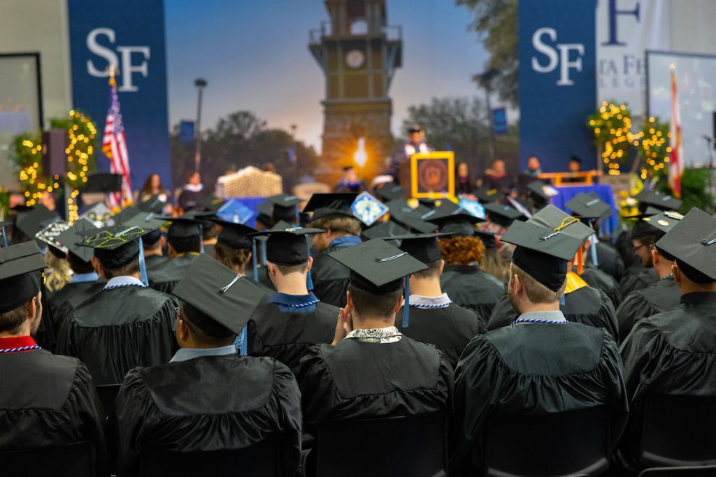 Photo of SF students at graduation ceremony in the gymnasium in May 2023.